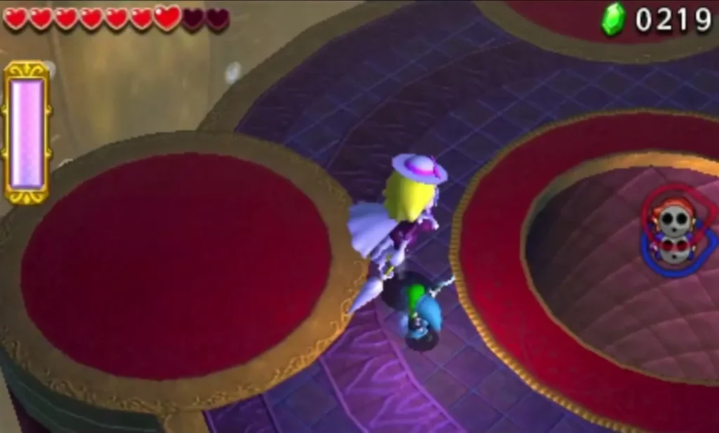 Lady Maud hovers over the pit as a Link stands on the arena edge