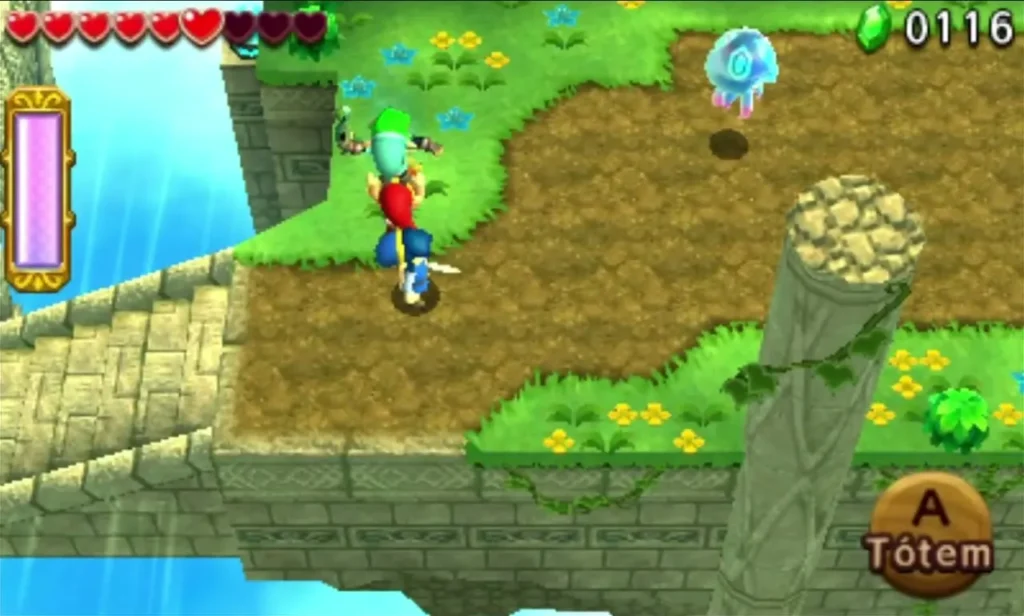 Link stands on a grassy walkway beside a stone pillar, with a Totem prompt on screen