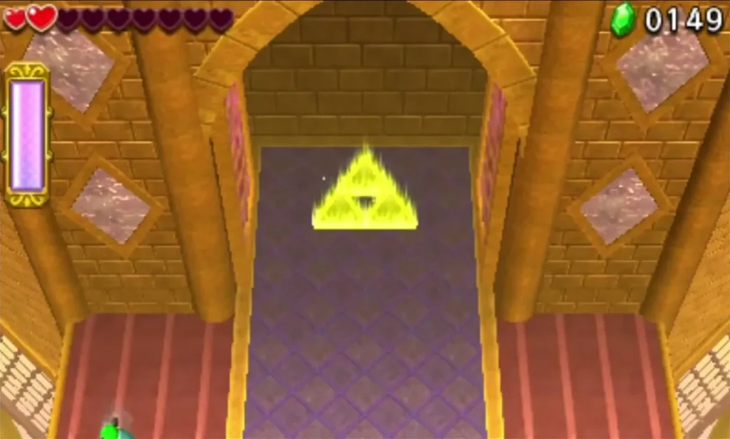 A large glowing Triforce appears at the end of the temple entrance hall