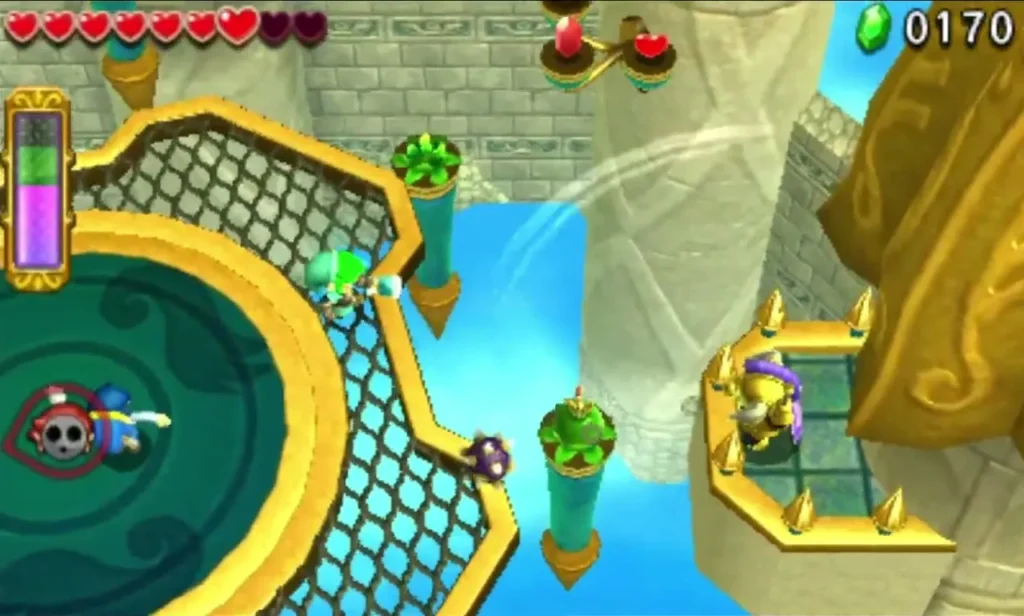 Link stands at the edge of a round platform in Deception Castle, with an enemy marked by a red circle nearby