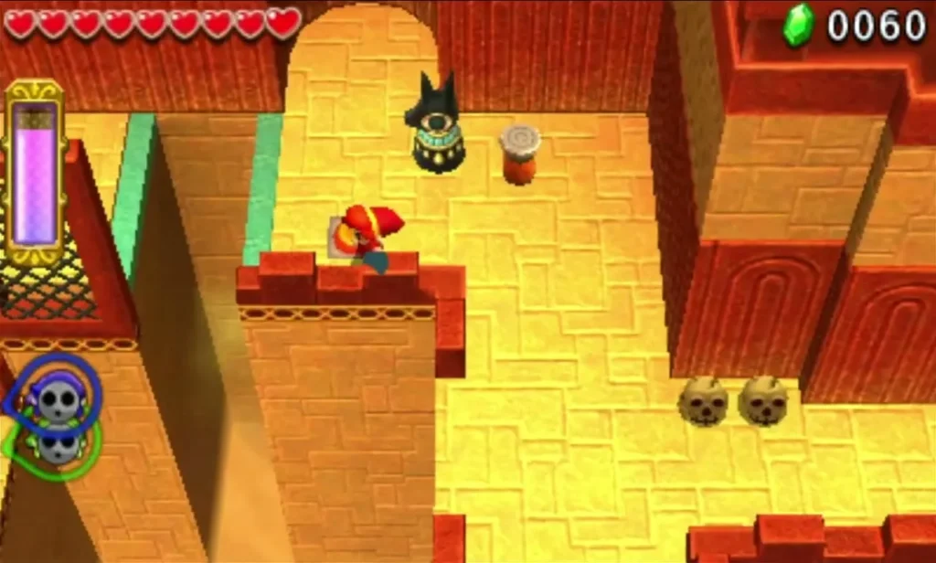 Blue-capped Link beside a dark Anubis statue and a clay pot on a sandstone ledge