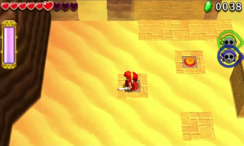 Red Link steps on an orange floor switch set into the sand beside a teammate