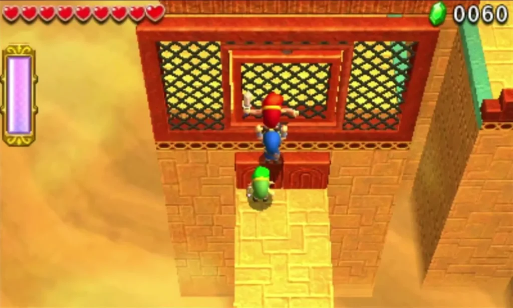 Link stands under a lattice grated wall with a panel, a teammate on the sand below