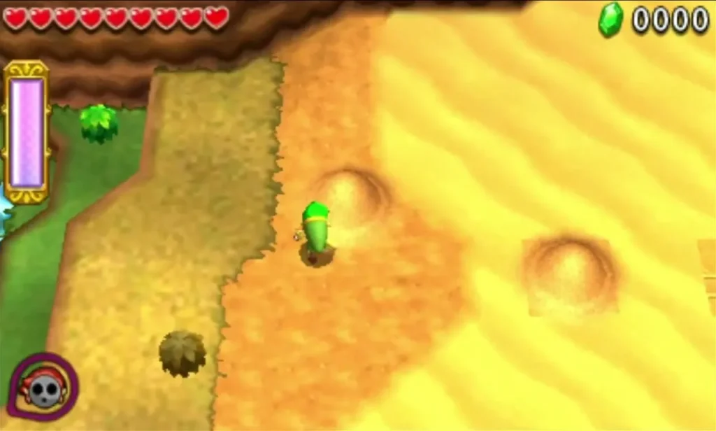 Wide yellow sand dunes with sand mounds and a green Link on a tiled path