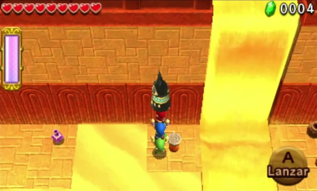 Link carries an Anubis statue overhead along a yellow sand river in Stone Corridors
