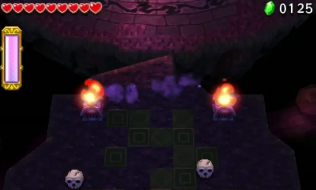 Skulls and grass on a stone ledge beside two lit braziers in Stage 4 of the Grim Temple