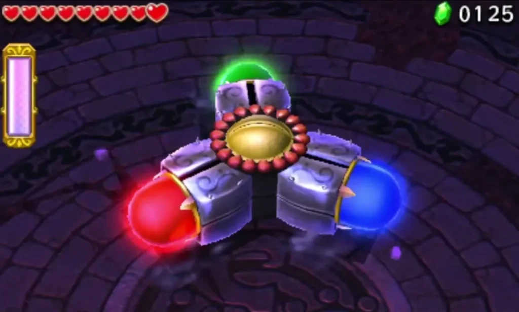 Prismantus with three coloured bulbs and an eye sits in the round arena