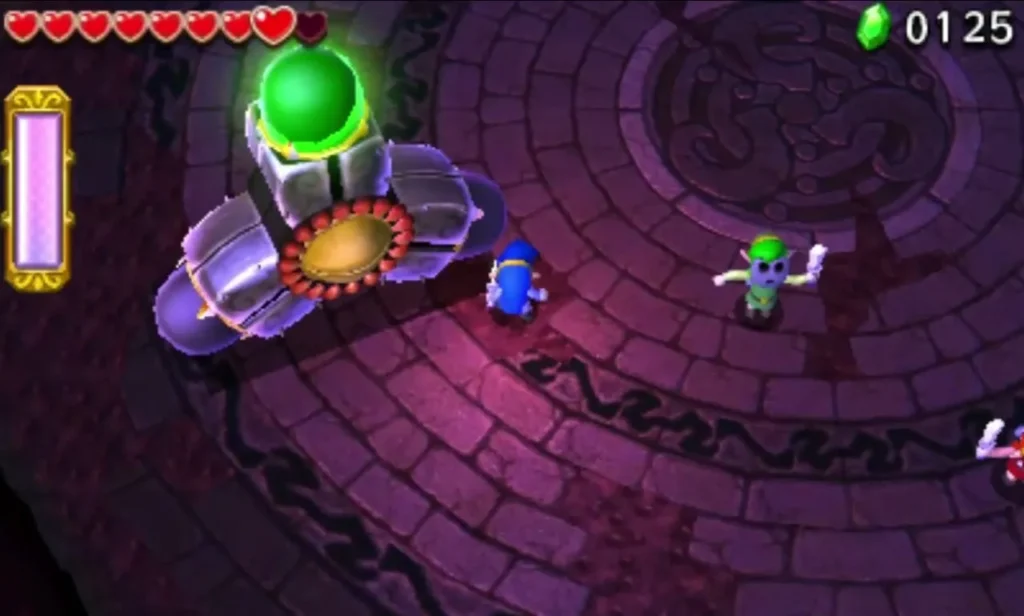 Link strikes the glowing green bulb on one of Prismantus's arms