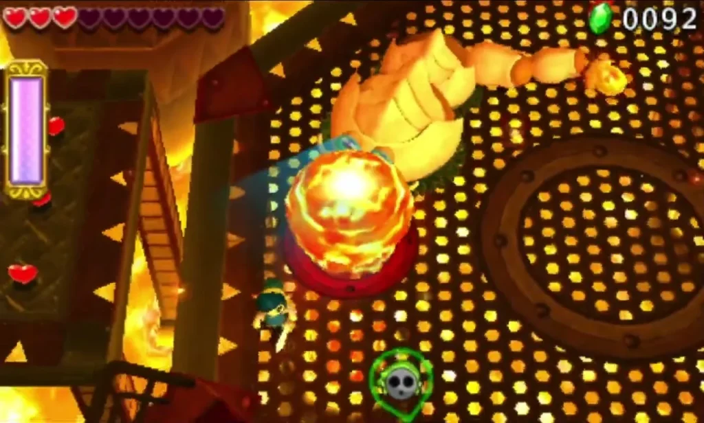 A lava pillar burns up through a red grate beside the worm boss in the Fire Temple arena A lava pillar burns up through a red grate beside the worm boss in the Fire Temple arena