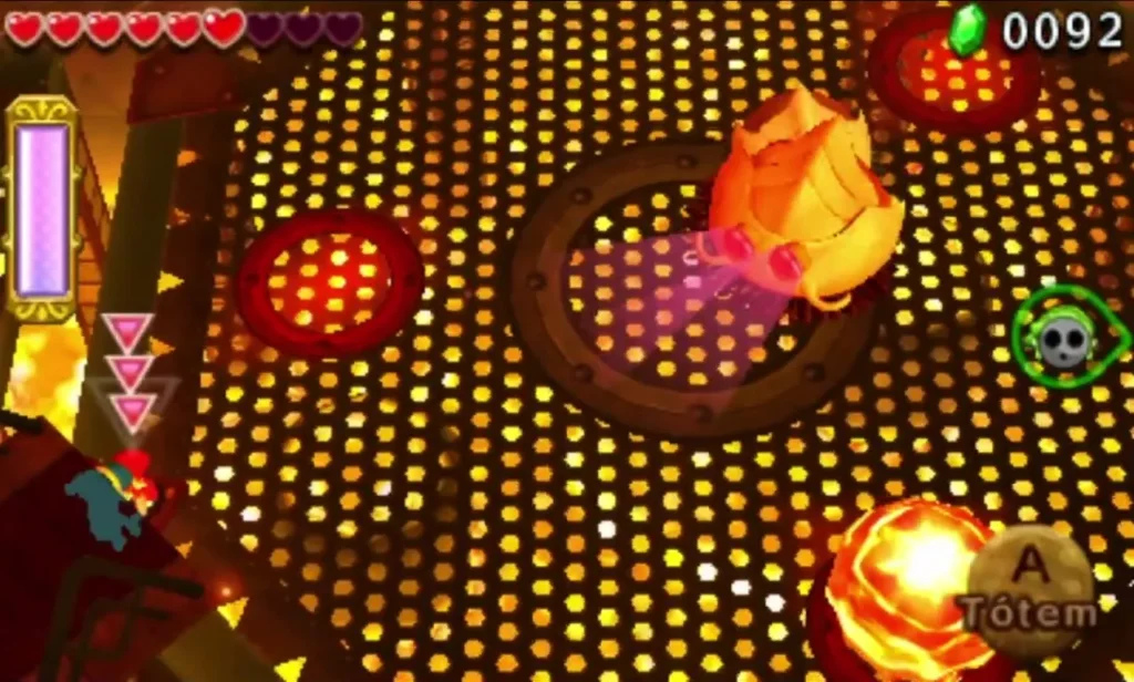 A Totem prompt appears beside Moldorm's raised tail near the edge of the Fire Temple arena A Totem prompt appears beside Moldorm's raised tail near the edge of the Fire Temple arena