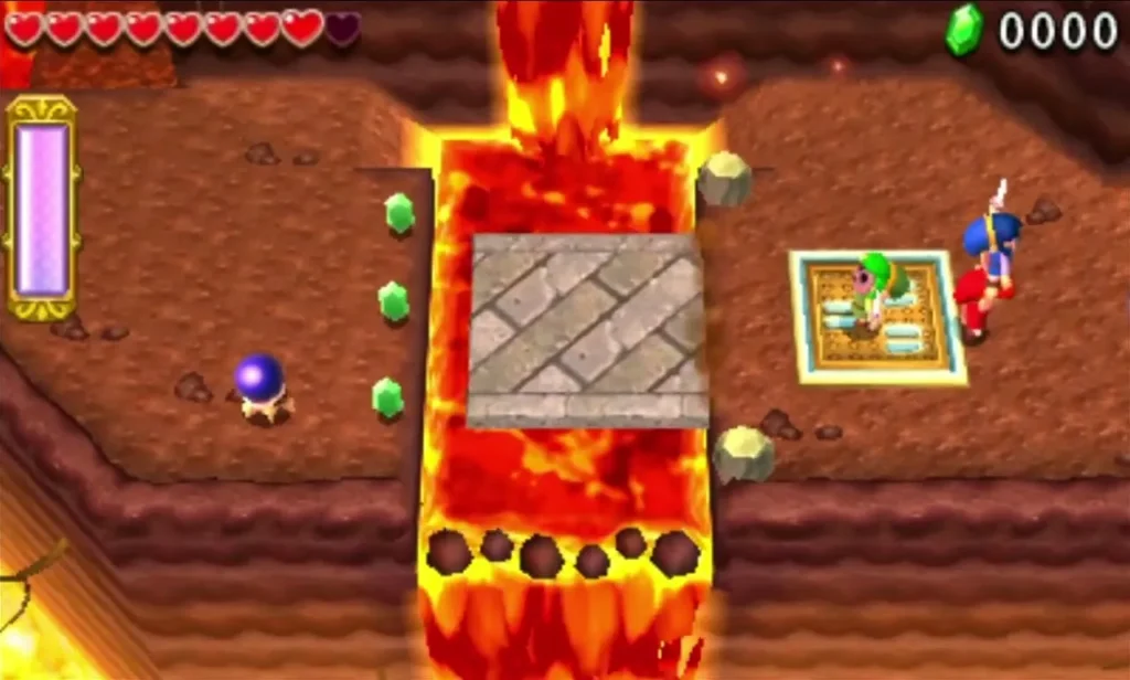 Two Links stand on a glowing pressure tile beside a stone block set in lava on the Blazing Trail's first stage Two Links stand on a glowing pressure tile beside a stone block set in lava on the Blazing Trail's first stage