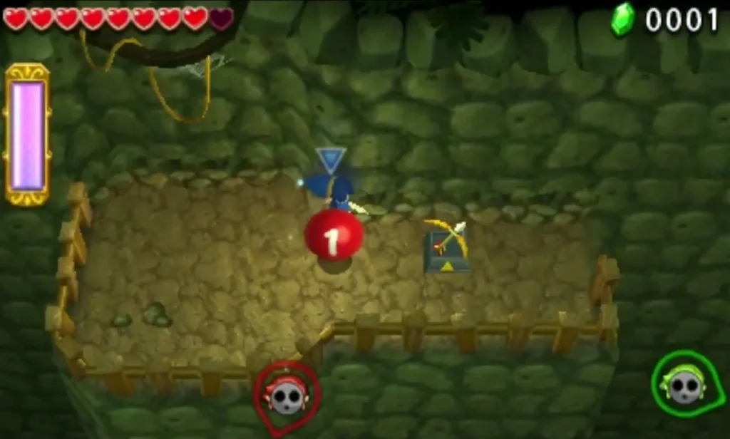 Link on a Buzz Blob Cave ledge with a red Balloon above the bridge