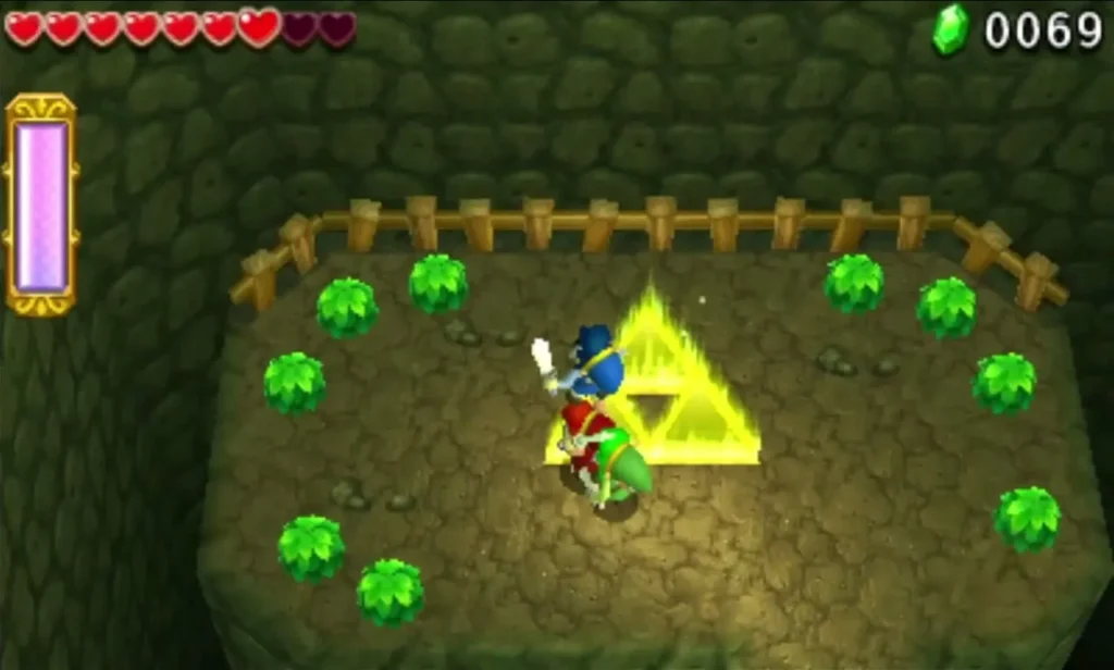 Triforce Gateway on a platform ringed by green Rupees in the Electric Cavern