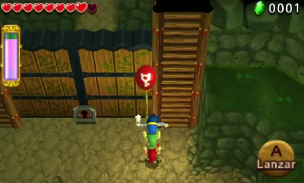 Link under a red Balloon holding the Key beside the gate in Buzz Blob Cave