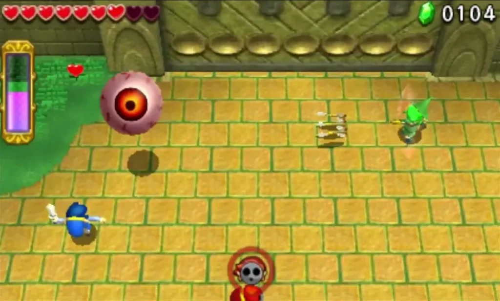 Margoma's eye rolls loose across the arena while a Link stands ready with the Sword