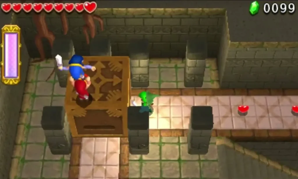 Link pushes a large wooden block along the stone floor, with another Link behind it