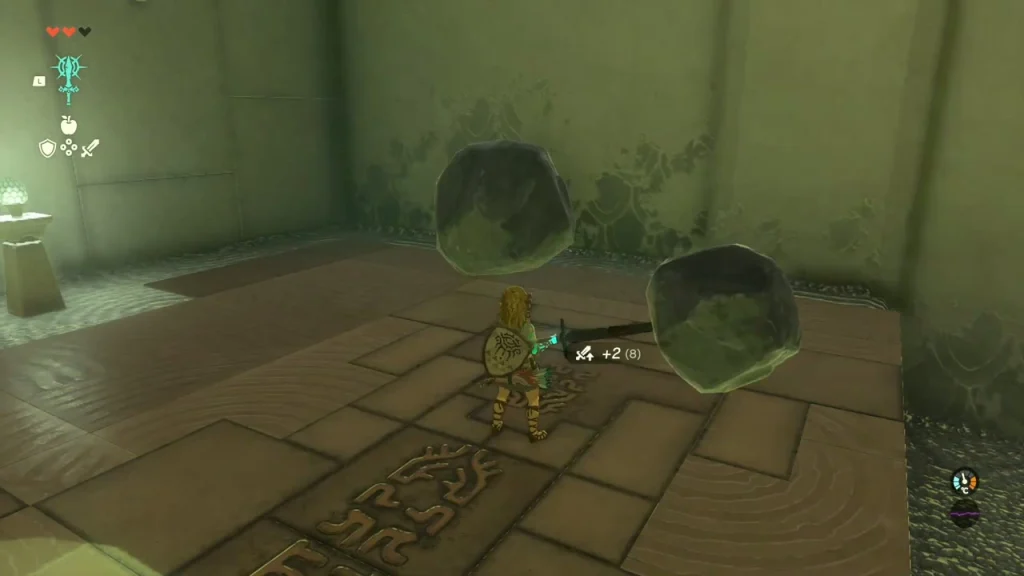 Two boulders beside a weapon showing a plus two attack boost from the fused material Two boulders beside a weapon showing a plus two attack boost from the fused material