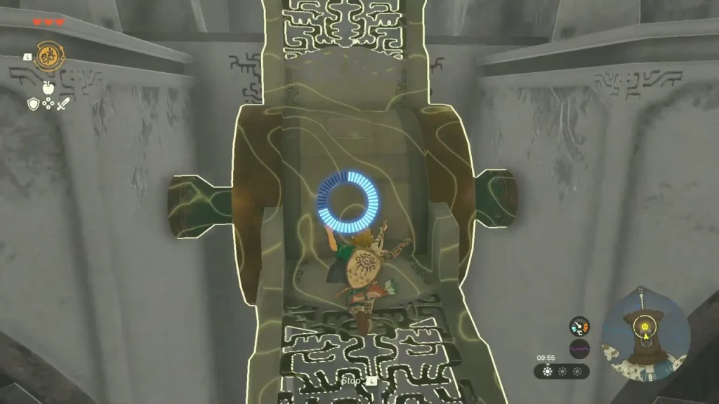 Stone slab outlined in gold with a blue rewind ring as it travels back along its track Stone slab outlined in gold with a blue rewind ring as it travels back along its track