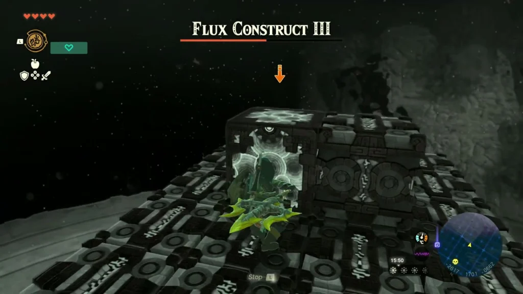 Flux Construct III core cube with an orange target arrow on stone blocks Flux Construct III core cube with an orange target arrow on stone blocks