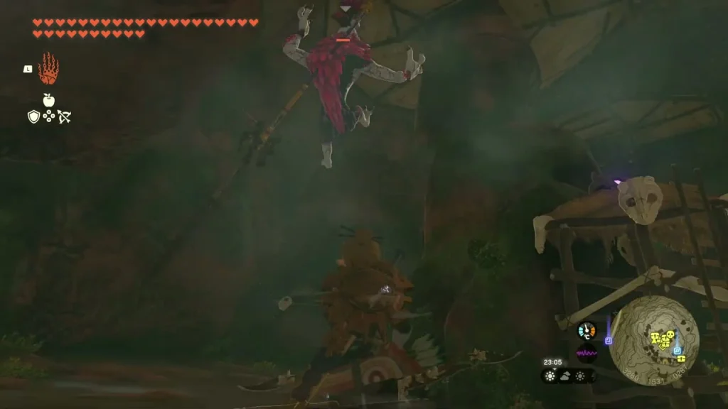 Horriblin leaping above a wooden scaffold tower in the cavern Horriblin leaping above a wooden scaffold tower in the cavern