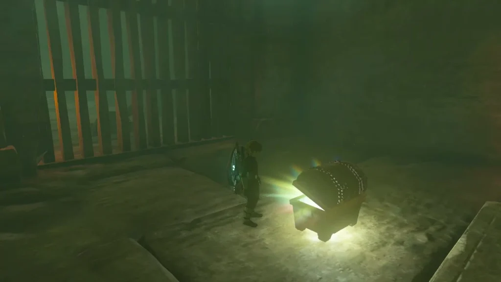 Open treasure chest glowing in a torchlit room behind iron bars Open treasure chest glowing in a torchlit room behind iron bars