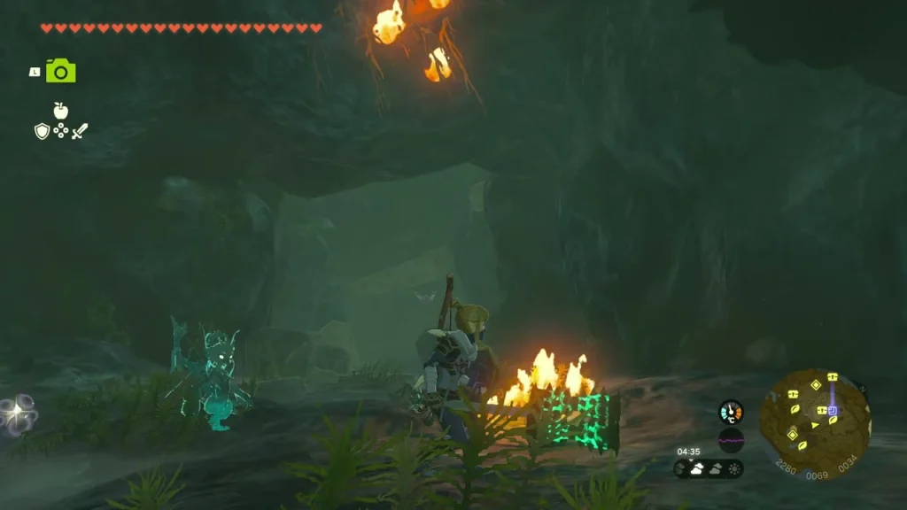 Small campfire burning on a cave ledge Small campfire burning on a cave ledge