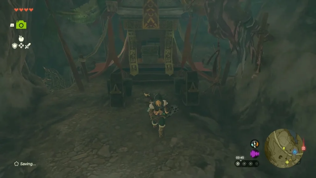 Red and gold canopy over a chest at the back of the cave Red and gold canopy over a chest at the back of the cave
