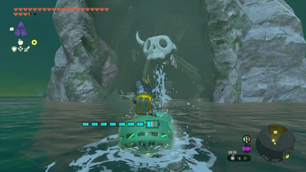 Giant skull above a sea cave mouth between two rock pillars