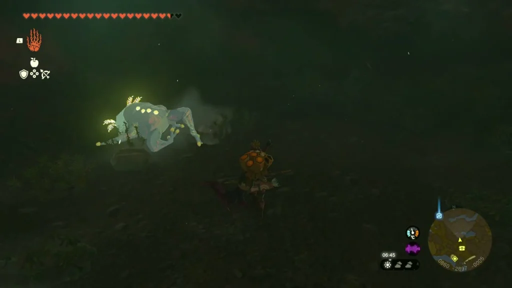 Pale Bubbulfrog floating in the dark chamber