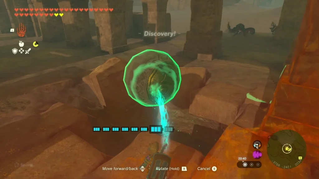 Orb being set into the doorway under the ruins