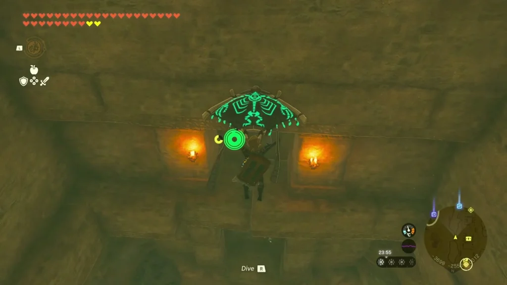 Torch-lit stone gate in the dark water-filled passage
