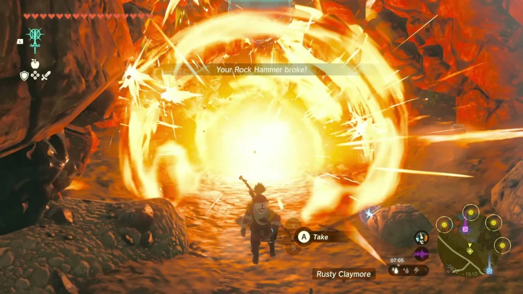 Explosion breaking open the rubble wall at the cave entrance