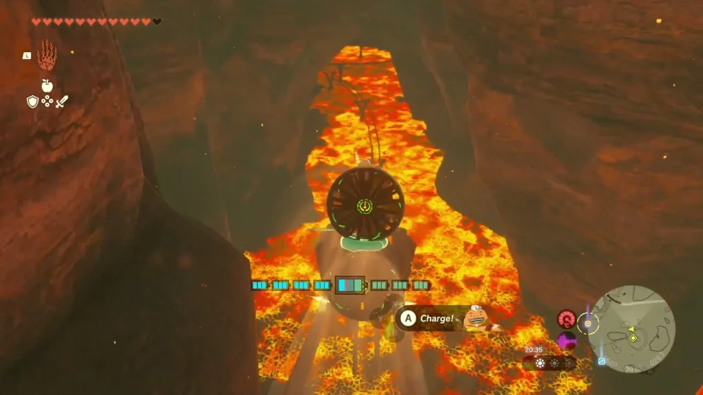 Fan cart riding the rails over a lava pool with a Charge prompt Fan cart riding the rails over a lava pool with a Charge prompt