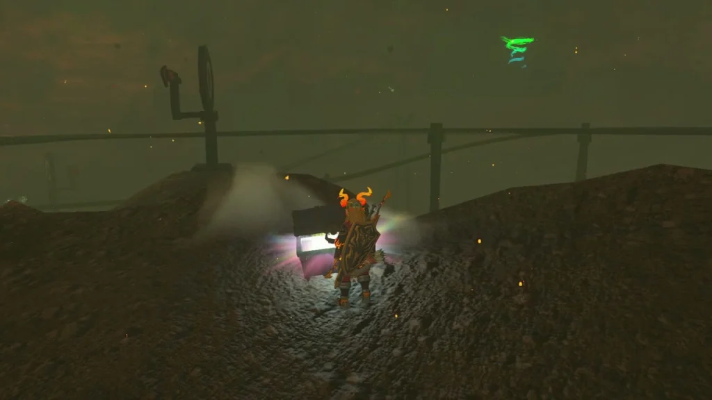 Glowing chest on a mound of ash beside the rails Glowing chest on a mound of ash beside the rails