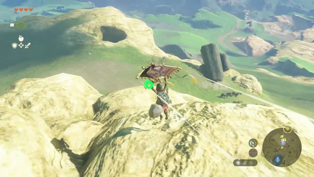 Round hole in a pale rock hilltop on Hyrule Ridge, with a toppled stone column beside it Round hole in a pale rock hilltop on Hyrule Ridge, with a toppled stone column beside it