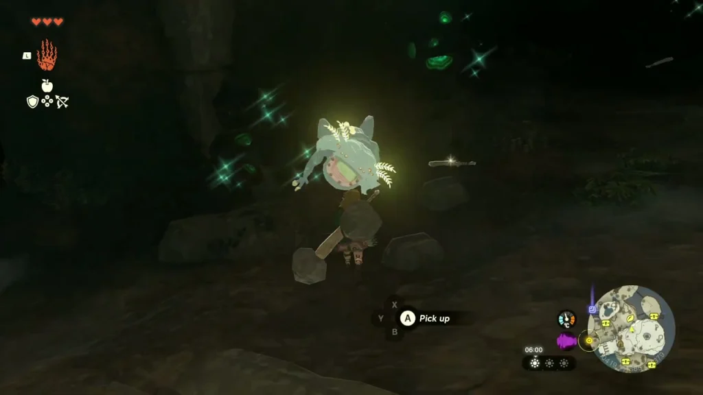 Glowing Bubbulfrog hovering in the dark cavern near green crystal
