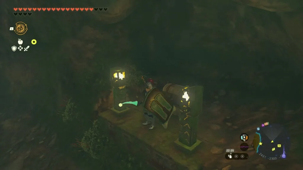 Chest lit between two glowing stone pillars in the cave