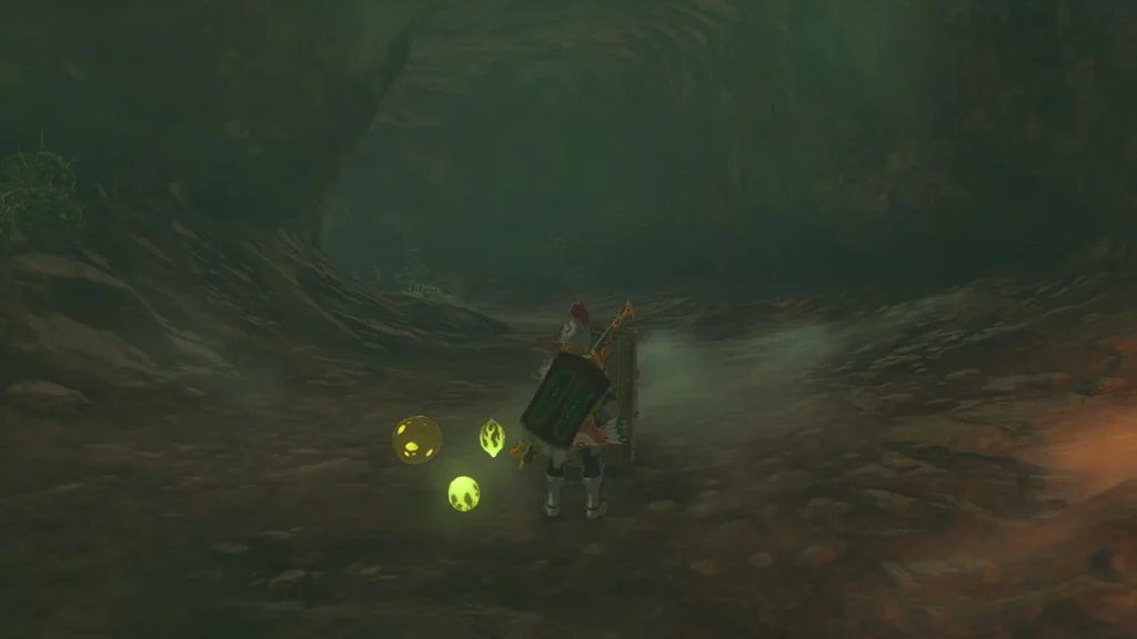 Rocky cavern floor lit by glowing Brightbloom Seeds