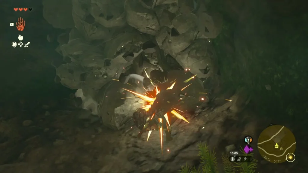 Cracked boulder wall bursting apart in an explosion Cracked boulder wall bursting apart in an explosion