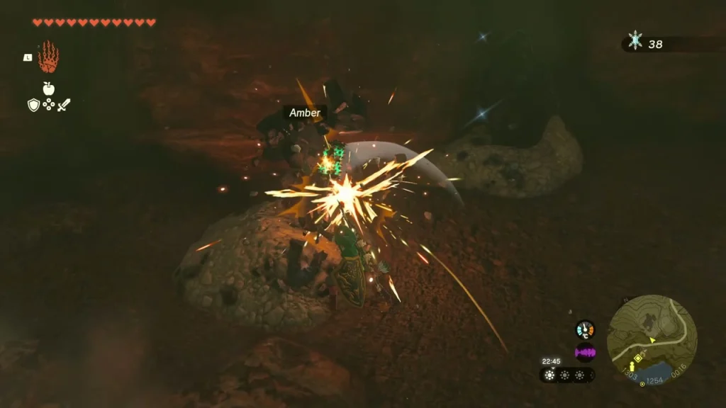 Amber ore deposit being broken apart in a burst of sparks