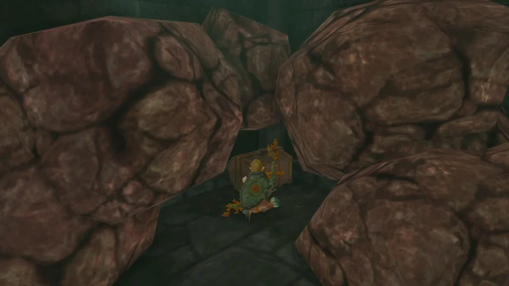 Large boulders piled in a stone room