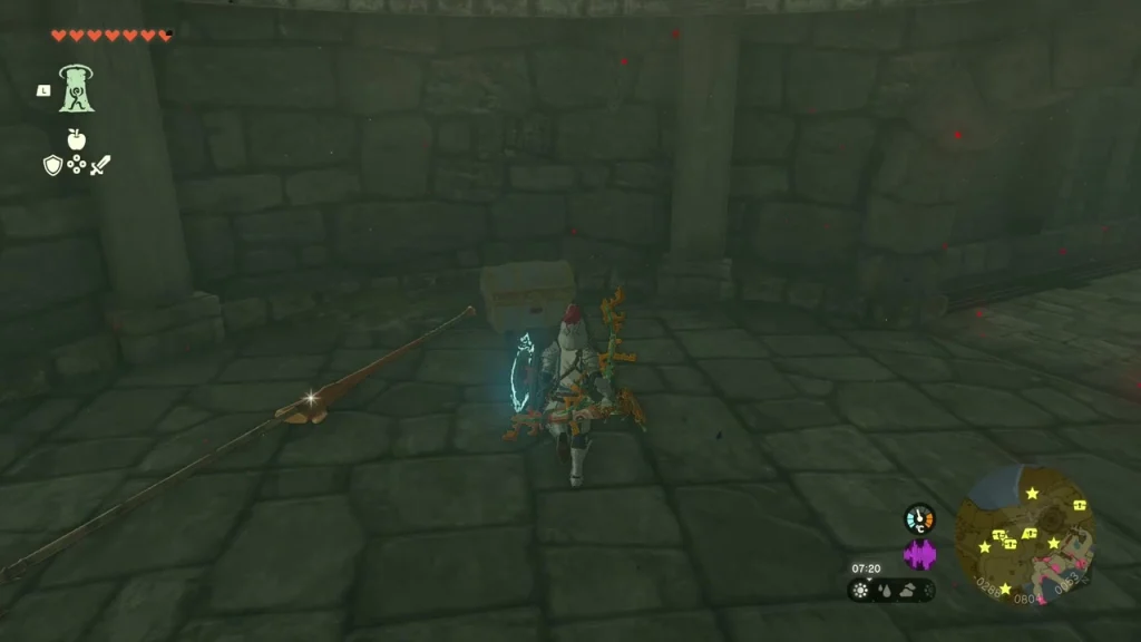 Halberd lying on the floor of a stone room
