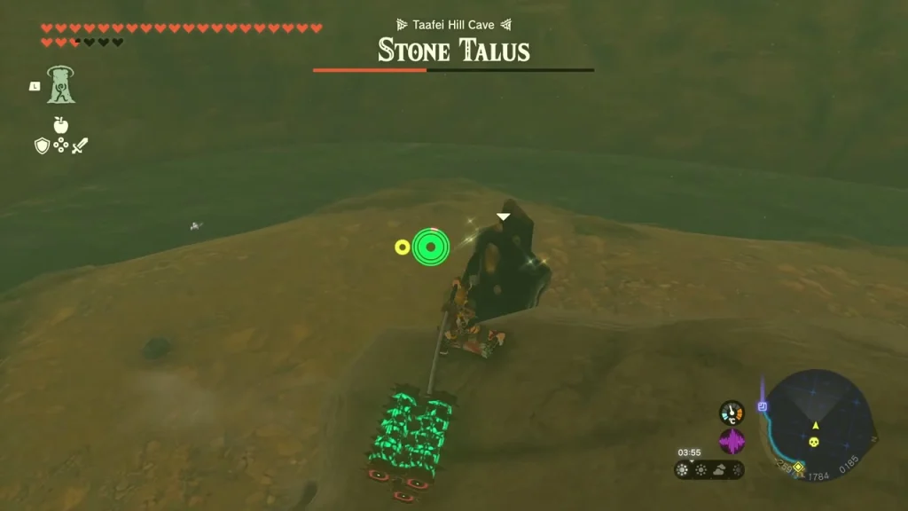 Stone Talus boss bar shown over the sandy cave floor Stone Talus boss bar shown over the sandy cave floor