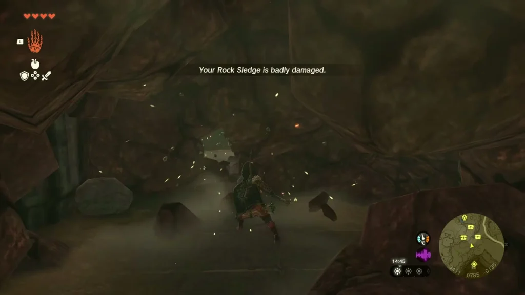 Rock Sledge smashing cracked rock in a tunnel with fragments flying Rock Sledge smashing cracked rock in a tunnel with fragments flying