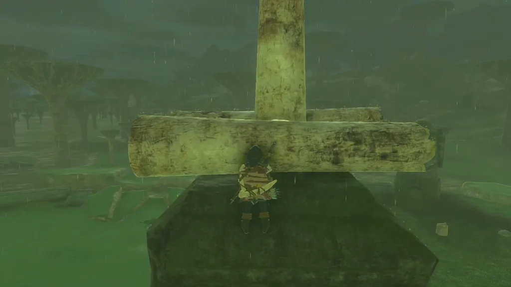 Large wooden cross resting on a stone block with the plateau stretching behind Large wooden cross resting on a stone block with the plateau stretching behind