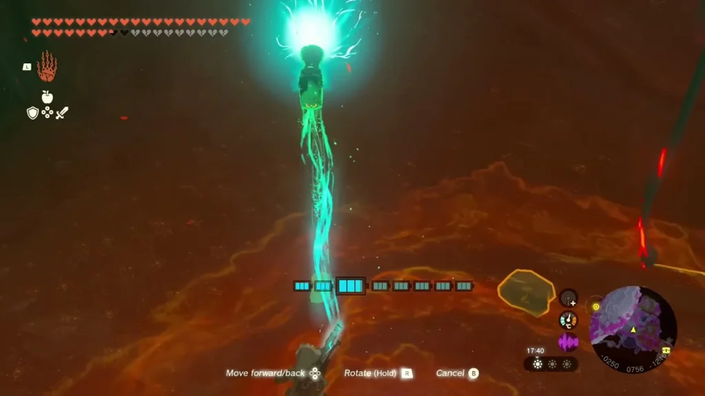 Tall green energy beam rising from a ledge above a lava-lit chamber Tall green energy beam rising from a ledge above a lava-lit chamber
