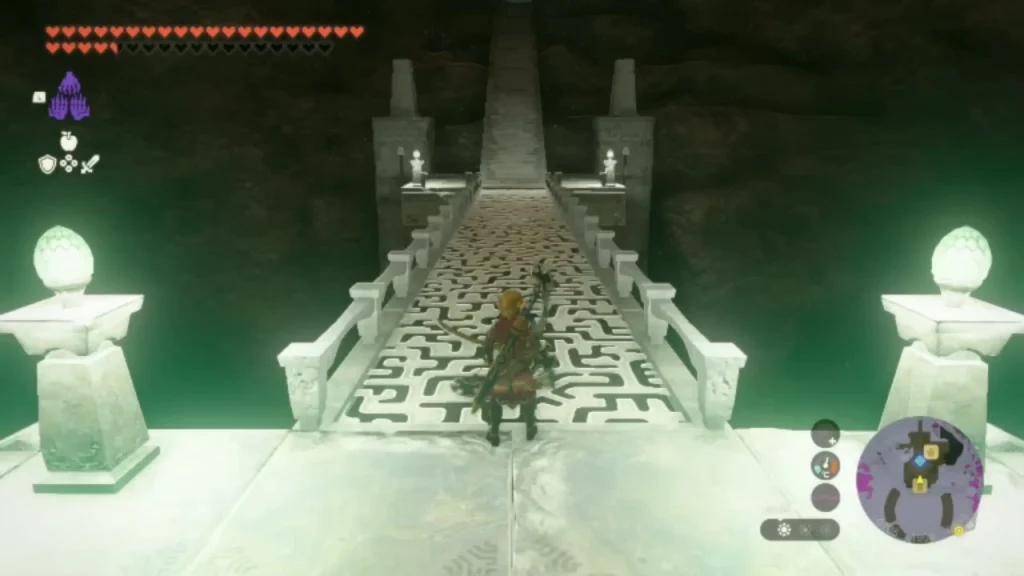 Stone walkway with a carved maze pattern between two glowing pillars Stone walkway with a carved maze pattern between two glowing pillars