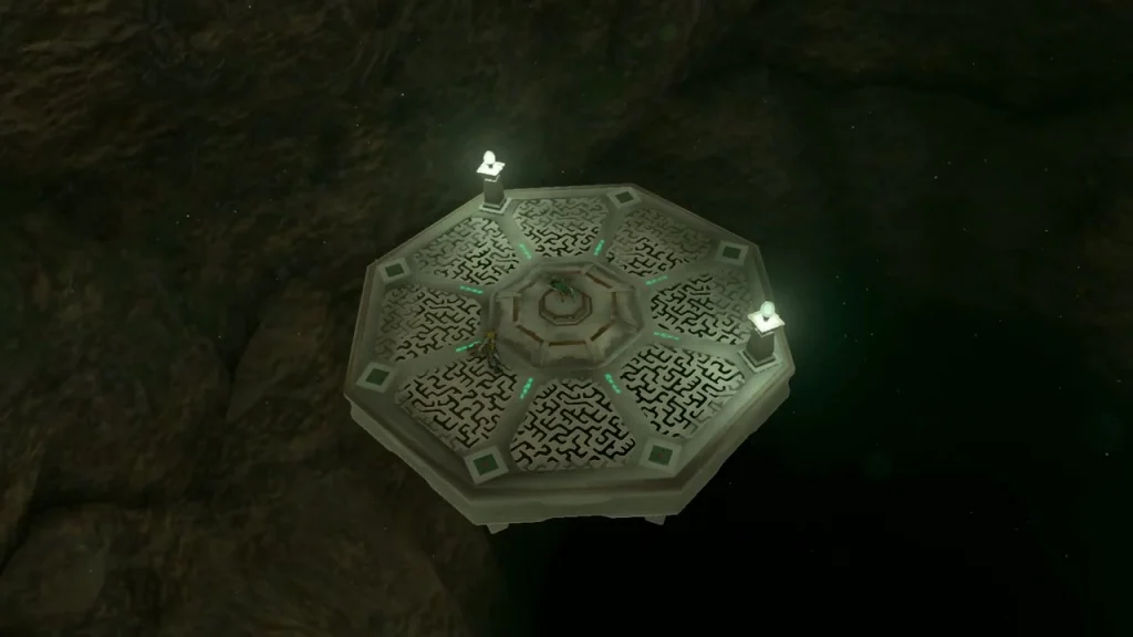 Octagonal elevator pedestal in the dark chasm that carries the mask into the Depths Octagonal elevator pedestal in the dark chasm that carries the mask into the Depths