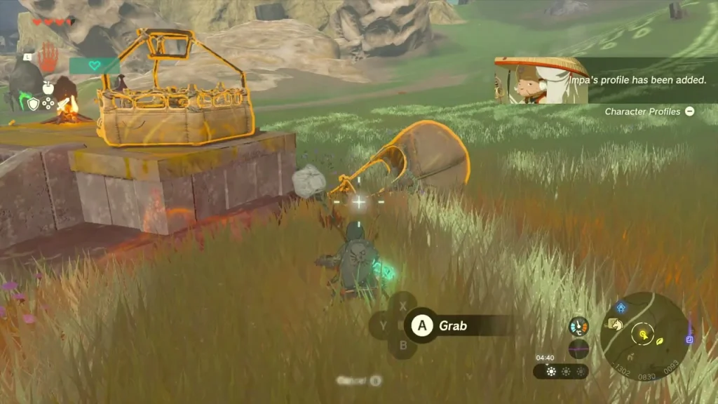 Balloon envelope lying in the grass beside the platform with the Ultrahand Grab prompt Balloon envelope lying in the grass beside the platform with the Ultrahand Grab prompt