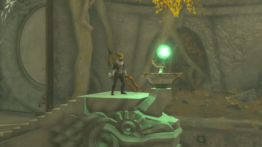 Zonai mask on its pedestal with a green beam of light rising from it